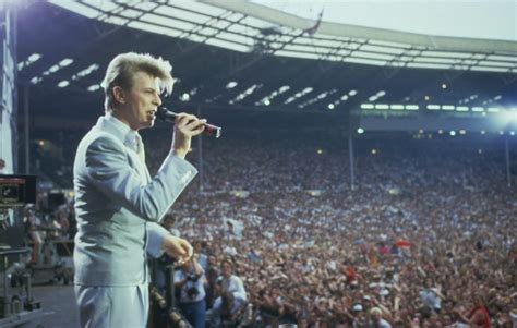 Queen performing at live aid in front of 72,000 people in wembley stadium, london on the 13th july, 1985. David Bowie's 'Let's Dance' demo released to mark his 71st ...