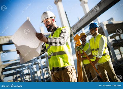 Portrait Of Construction Engineers Working On Building Site Stock Image