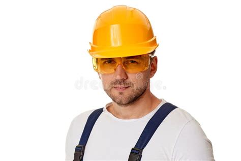 Portrait Of Caucasian Man Construction Worker In Yellow Hard Hat Stock