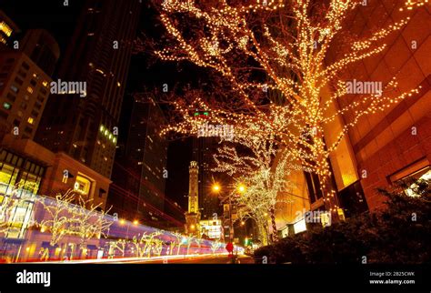Chicago Water Tower And Michigan Avenue Decorated In Holiday Lights