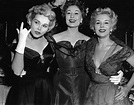 Golden glamour: The Gabor sisters pose at a cocktail party to celebrate ...