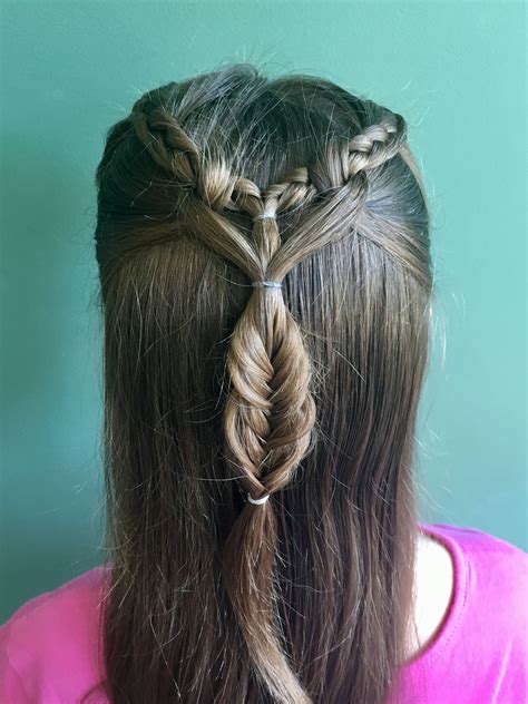 Simple hairstyle.ideal for an everyday look!!!beautiful accessories to. Heart wrapped Dutch braid. Perfect for growing out bangs ...