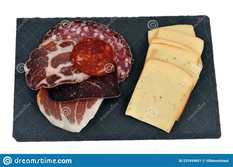 Assortment Of Cold Meats And Cheese Slices To Make A Raclette On White