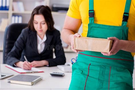 The Postman Delivering Parcel To The Office Stock Image Image Of