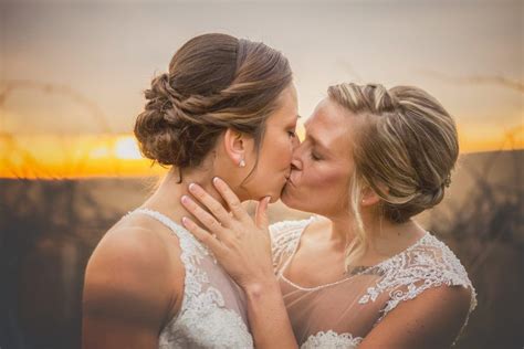 rustic winter wedding at pedretti s party barn viroqua wi heidi and kelly lesbian bride