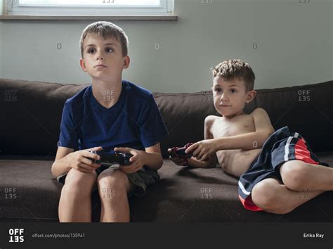 Two Boys Playing A Video Game Stock Photo Offset