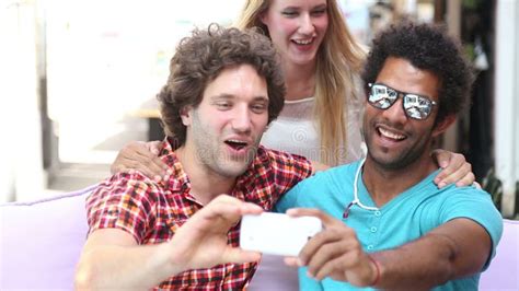 Three Young Friends Having Fun Taking Selfies Stock Footage Video Of Looking Cheerful 80417780