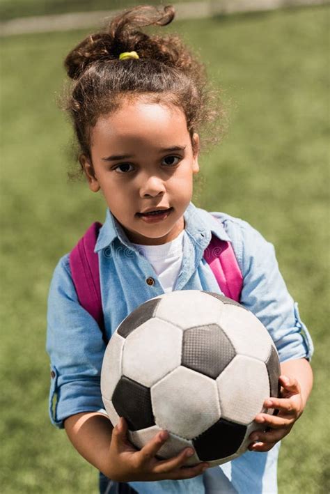 Cute Little Soccer American Girl Holding Ball Stock Photos Free