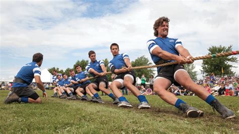 A contest of strength in which two teams tug on opposite ends of a rope, each trying to pull the other across a dividing line. Tug of War - History, Rules Tactics and Governing Body