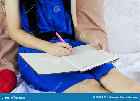 women hand writing down on blank workbook or booklet stock image image of writing workbook