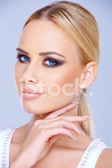 Beautiful Blue Eyed Woman Wearing Makeup Stock Photos