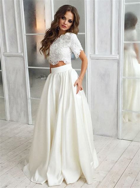 Since they use less fabric than the other dress shapes. Two Piece Lace Short Sleeves Satin Wedding Dress - Sassymyprom