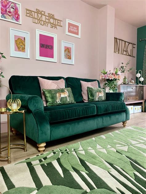 green velvet sofa  green leaf print rug green living room decor