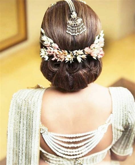 Indian Wedding Bun Hairstyles With Flowers Hairstyle Catalog