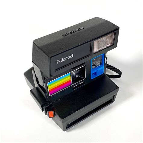 Polaroid Sun 600 With Upcycled Blue And Rainbow Face Refreshed