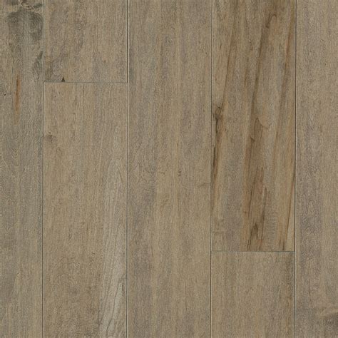 Pergo is a great affordable option for durability and look. Pergo Max 5.36-in Uptown Maple Engineered (23.25-sq ft) at Lowes.com