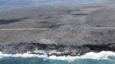 Lava Ocean Entry Widens Building Black Sand Beach