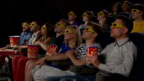 Stock Video Clip Of Young People Watch Movies In Cinema Watch