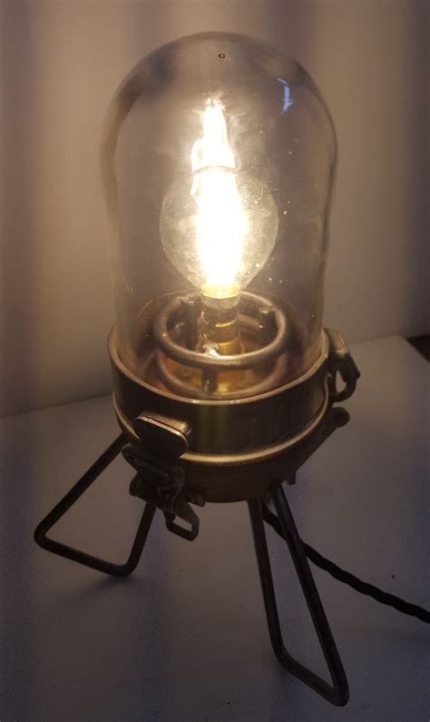 Turned oak base with lacquered steel legs and latches. Oak Tripod Lamp - Mendham Maker