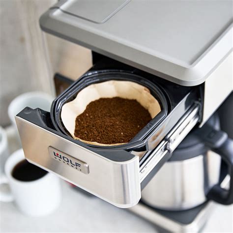 To reset water filter reminder, turn mode selector bezel to clean, and hold down the zero button until water filter reminder is removed. Wolf Gourmet 10-Cup Coffee Maker | Sur La Table