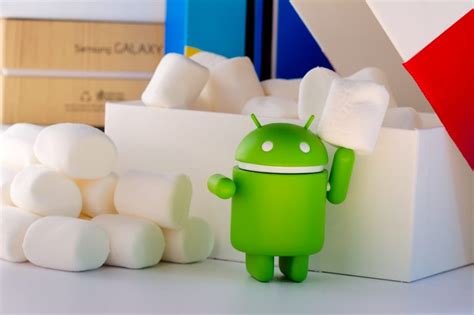 Green Android Logo Holding White Marshmallows Free Image Peakpx