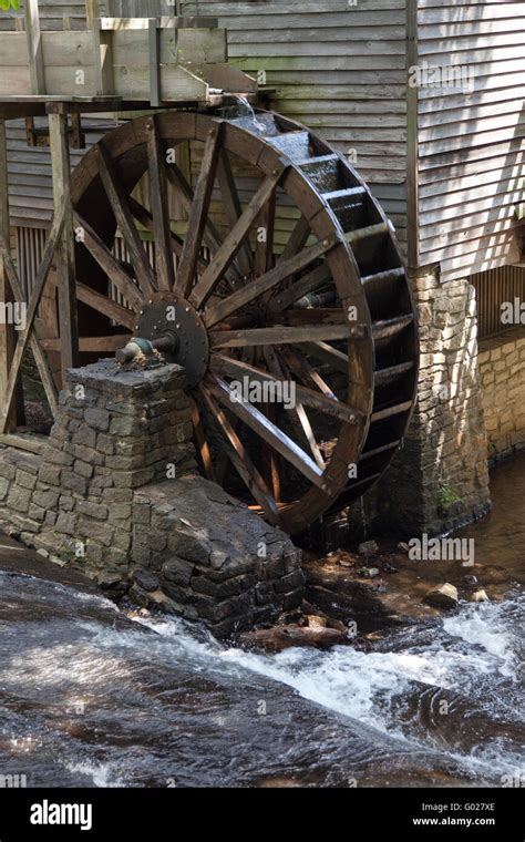 Old Grist Mill Wooden Water Wheel By A Stream Stock Photo Alamy