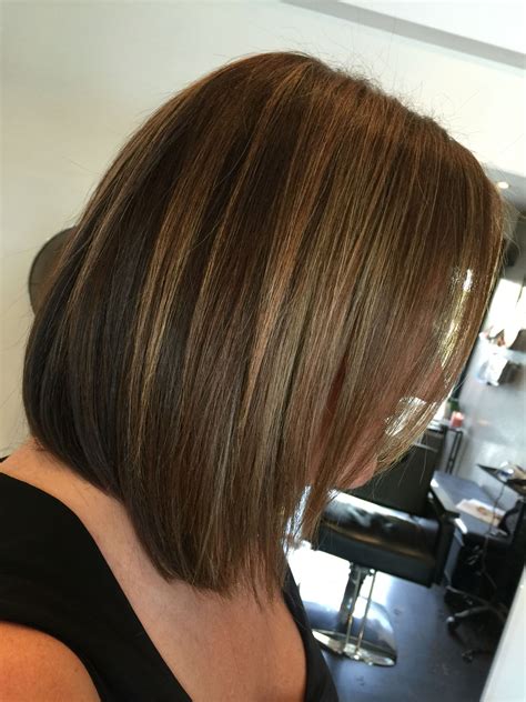 The actress in her luscious brown hair done in layers and adorned with blonde highlights. Long layered bob, sandy, caramel highlights on natural ...