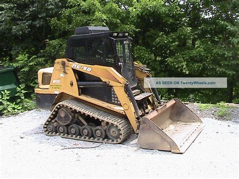 Asv Rc 50 With Backhoe Bucket And Forks