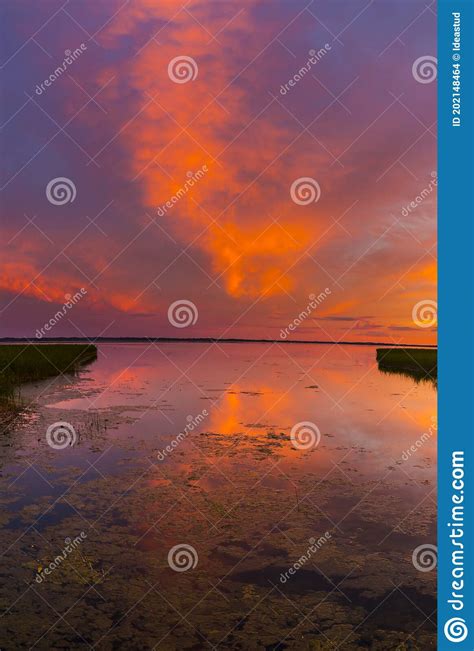 Beautiful Colorful Sunset Over The Lake Summer Landscape Stock Photo