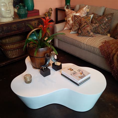 Book shaped coffee table should always look refreshing, unique and elegant, as that is where you would sit for a fresh cup of coffee and feel rejuvenated. Organic Shaped White Lacquer Coffee Table - Mecox Gardens