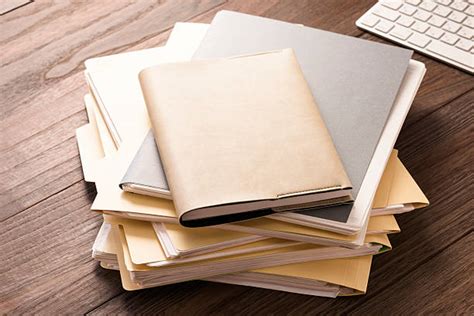 Best Stack Of File Folders On A Wooden Desk Stock Photos Pictures