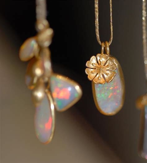 Bewitching Delicate Amulet Pendants Of Opals And Gold On Cord