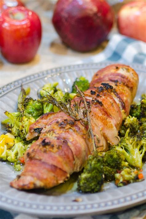 Pork loin is so easy and quick to cook for a weeknight dinner, but why not kick your meal up a notch by a moist and juicy cajun seasoned pork tenderloin wrapped in crispy bacon and glazed in an apricot dijon sauce! Bacon Wrapped Pork Tenderloin with a Garlic Rosemary Rub ...