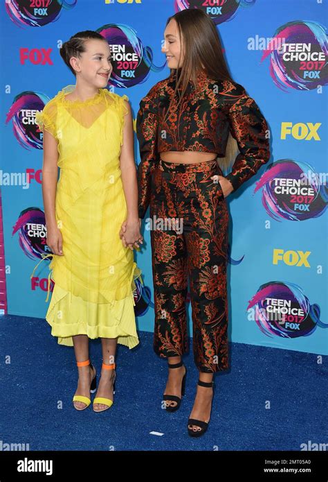 Millie Bobby Brown Left And Maddie Ziegler Arrive At The Teen Choice