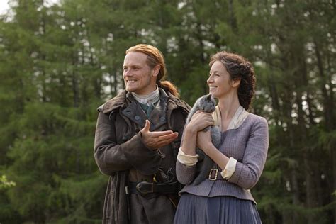 New Still Of Jamie Fraser Claire Fraser And Adso In Outlander Season 5