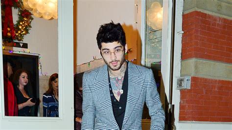 zayn malik takes a page out of harry styles s playbook british vogue