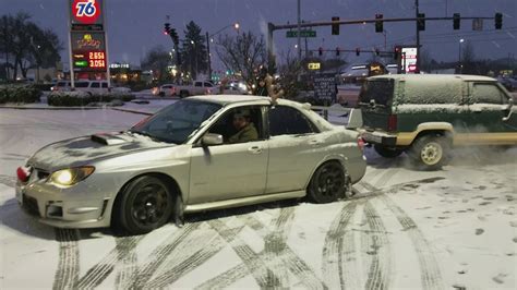 Subaru Impreza Wrx Sti Pulls Disabled Ford Bronco Ii On Snowy Christmas
