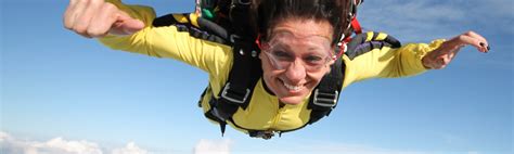 Female Tandem Skydiver In Yellow Oklahoma Skydiving Center