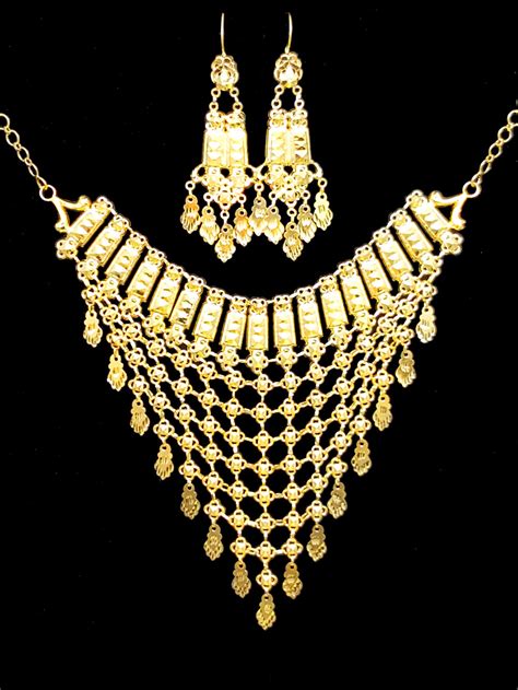 Check spelling or type a new query. 21k gold necklace set (5325) - Alquds Jewelry