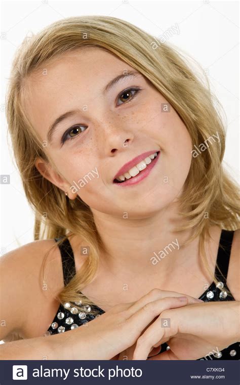Close Up Of A Tween Girl Smiling At The Camera Stock Photo Alamy