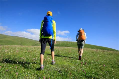 Women Friends Hiking In Grassland Mountains Stock Photo Image Of