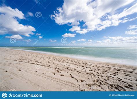 Tropical Beach Scene South Florida Sky Sand Shore Clouds Blue And Green