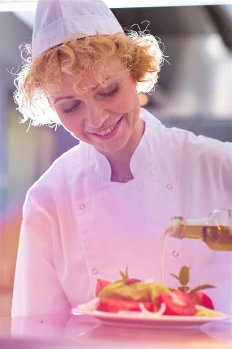 Chef Pouring Olive Oil Over Salad Stock Photo Image Of Holding
