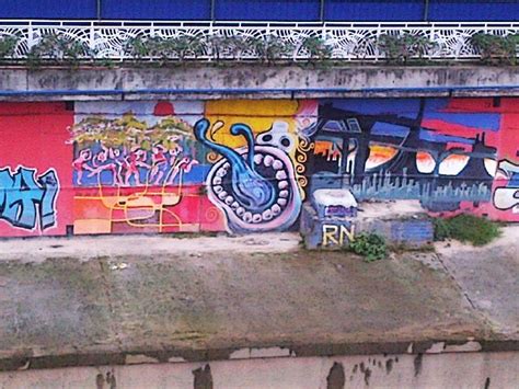 Kuala lumpur street illustrations & vectors. Street art on the riverbank near Petaling Street, Kuala Lumpur