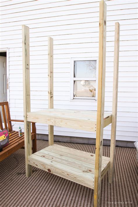 Diy Potting Bench With Decorative Roof Love Grows Wild