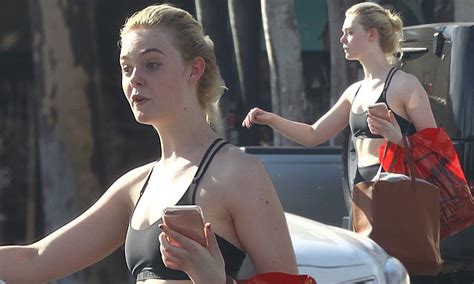 Makeup Free Elle Fanning Bares Her Toned Abs In Sports Bra