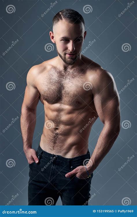 Muscular Shirtless Man Standing With Hands In Pockets Stock Image Image Of Muscle Hips