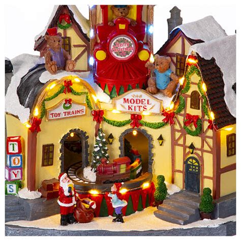 Christmas Village Toy Shop With Train 25x20x30 Cm Online Sales On