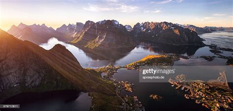 Midnight Sun Over Reine Lofoten Norway High Res Stock Photo Getty Images