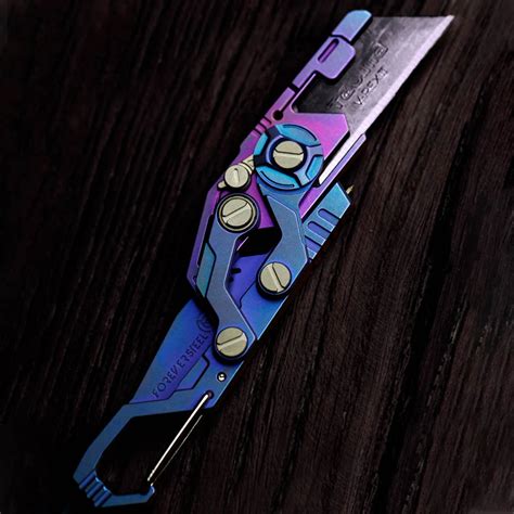 This Titanium Utility Knife Looks Like A Chameleon On A Branch